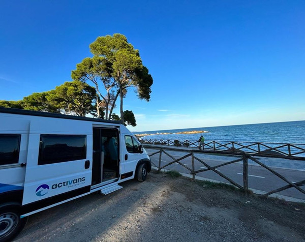 campervan in front of the sea